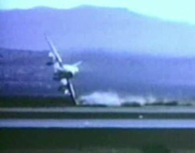 View of a well-documented F-100 crash. Click on this 
          picture to start the video.