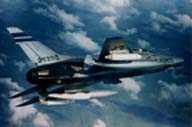 A picture of an F-100D over Vietnam. Click on this 
          picture to start the video.